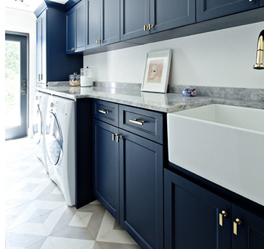 Custom Dark Blue Laundry Room Cabinet Design