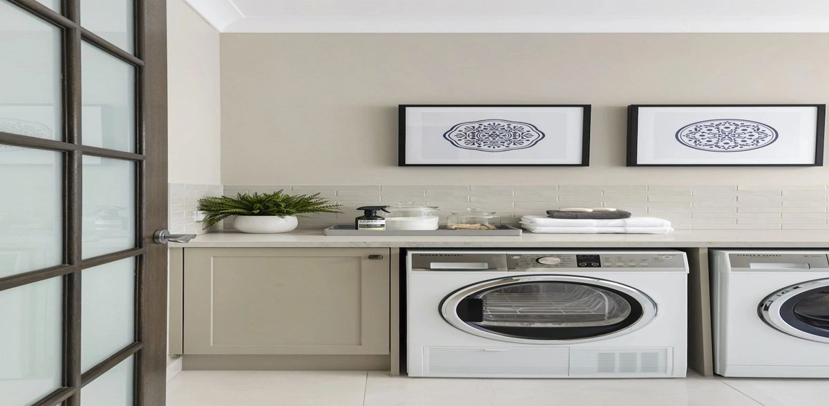 wood cabinet between washer and dryer